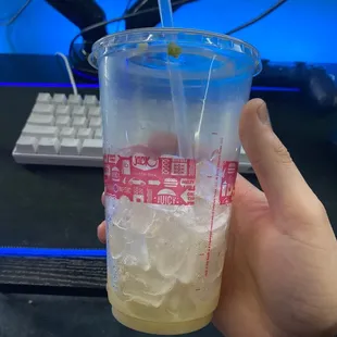 Piece of Taco lettuce on my iced coffee + filled to the top with ice. Pretty disgusting
