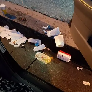 This is all the trash in the drive thru. Pretty gross if you ask me. Makes me question how clean everything else is?