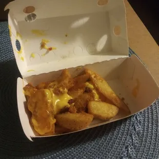 Cheddar bacon smothered &quot;fries&quot;. Lol