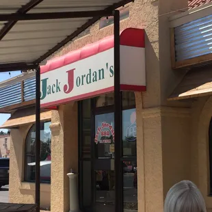 Front facade facing John Ben Sheppard Parkway. Parking and entrance on front and right side of establishment.