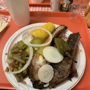 Two meat plate - ribs and brisket with green beans and corn.