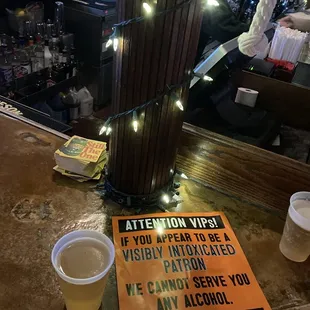 a sign on a bar