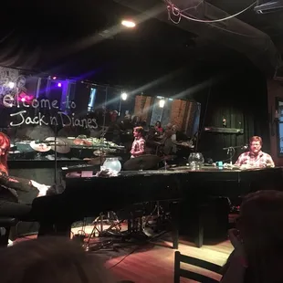  band playing on stage