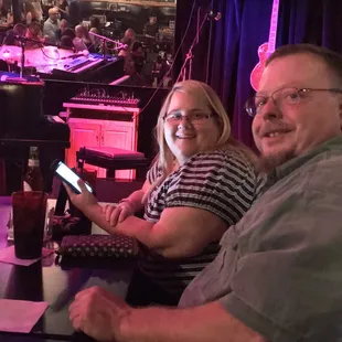  man and a woman sitting at a table