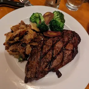 Ribeye steak.  You can&apos;t see the side of the Madagascar peppercorn sauce, but there was one.