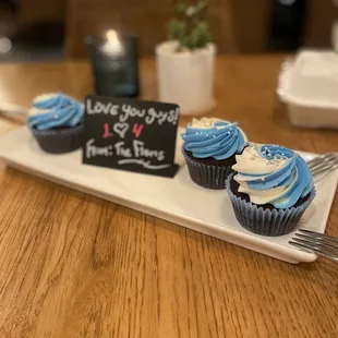It was our 14th wedding anniversary and a friend arranged to have a bottle of Prosecco and these cupcakes delivered to our table.