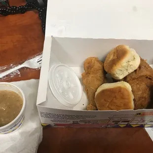 a box of fried chicken and biscuits