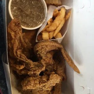 4 piece mixed box with fries, biscuits, and gravy. After drink and tax, just under $10.