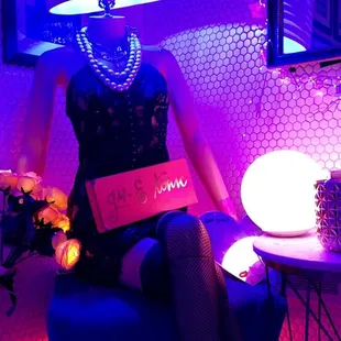 a woman sitting in a chair with a laptop