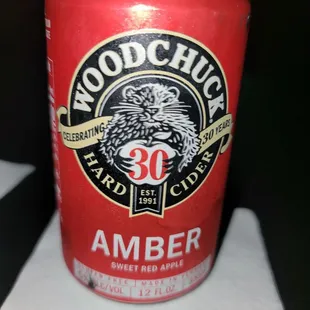 a can of beer on a table