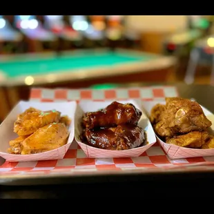 three trays of food