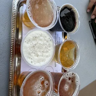 $18 flight: vanilla stout, tangerine, fest coast, pumpkin ale, captain boomer, nor cal