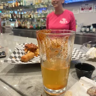 a woman sitting at a bar