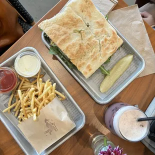 two trays of food on a table