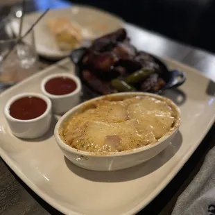 Cheesy Potatoes and Fire-Kissed Wings