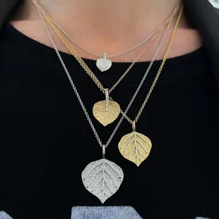 Handcrafted 18 karat gold aspen leaf collection.