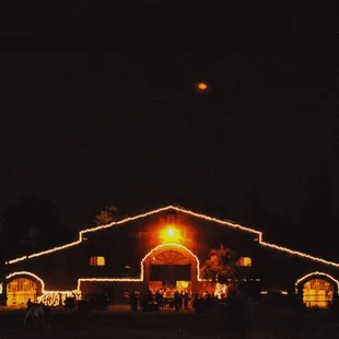 The New Barn lit up for a party, with Jupiter in the sky above.  3