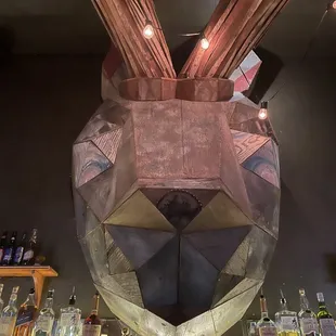 a man behind a bar counter