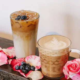 two iced coffees and flowers