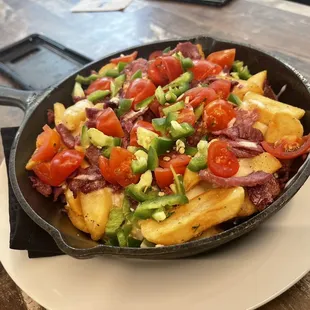 a skillet of food on a table