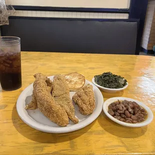 Fried catfish, collard greens and black-eyed peas.