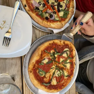 Margherita pizza and veggie pizza, crust wasn&apos;t too thin or too thick but just right. Toppings were fresh and generous.