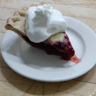 Razzledazzle fruit pie, blackberries, raspberries and apples, and don't forget the whipped cream! (Lip smackin' good).  Mmmm mmm