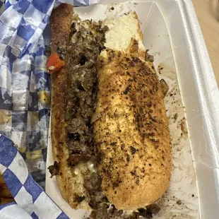 This is supposed to be a sirloin cheesesteak! The garlic powder on bun is burnt so it tastes bitter. The cheese tastes like cheez whiz.