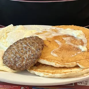 Eggs sausage Patty and pancakes,