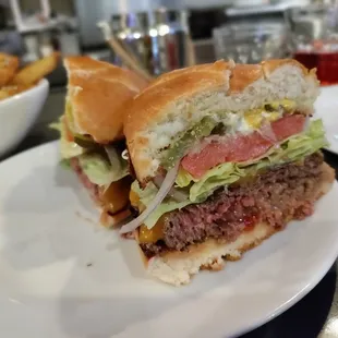 a hamburger and fries on a plate