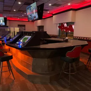 a bar with arcade machines