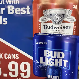 a budweiser beer can on display in a store