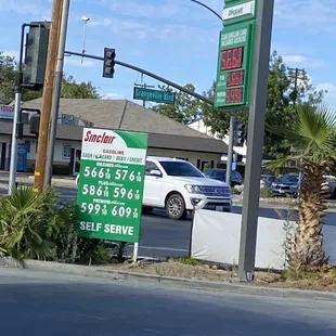 a gas station and a gas station sign