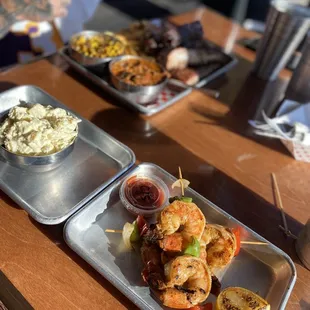 Amazing Cajun Shrimp, Potato Salad + One hander 1/2 Rack of Ribs with Sweet Chili and Corn. Delicious!
