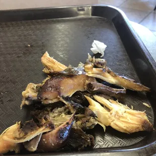 Portion of smoked chicken dinner that simply could not be chewed because it was so completely dried out.  Chicken Dinner