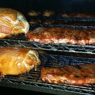 ows the meat being cooked in the oven