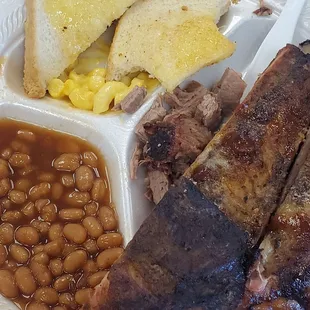 Brisket and Ribs with Mac&amp;Cheese, Baked Beans, and Buttered honey toast. Potatoe Salad on the side.
