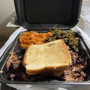 Pork ribs collard greens and candy yams with toast