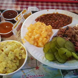 Cole Slaw, Baked Beans, Potato Salad, Mac & Cheese, Vegetable & Salad Du Jour, Green Beans, Corn & Apples