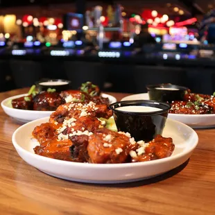 Jack&apos;s Bar + Grill offers delicious wings! With a variety of flavors, this is a dining special!