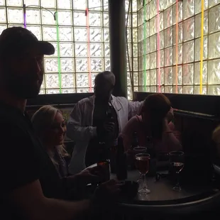  group of people sitting around a table