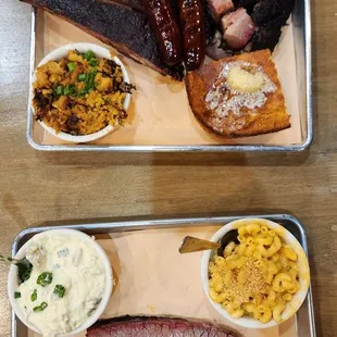 Brisket BBQ Plate &amp; The Texas Trinity plate with sides: Mustard potato salad, queso Mac n Cheese, Buttermilk Cornbread &amp; Sweet corn pudding