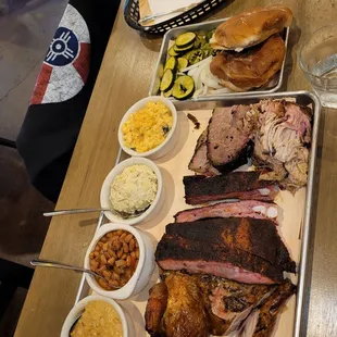 a variety of meats and sides