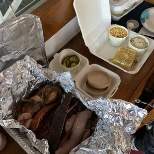 a tray of ribs and sides