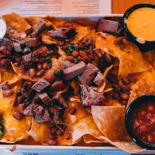 Loaded nachos with brisket
 IG: @thephotographerfoodie