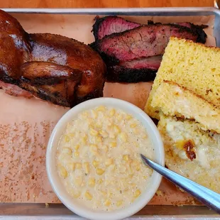 Brisket and chicken with creamed corn and cornbread