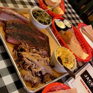 Pork ribs, pulled pork, brisket, queso Mac And Cheese, Quart Collard Greens, Hushpuppies