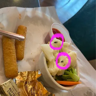 Flies everywhere landing on food making it unpleasant to be constantly swatting flies.