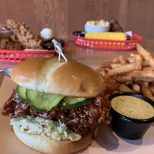 a pulled pork sandwich and fries