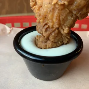 a fried chicken in a bowl